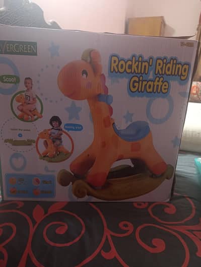 NEW BABY GIRAFFE ROCK A BABY TOY