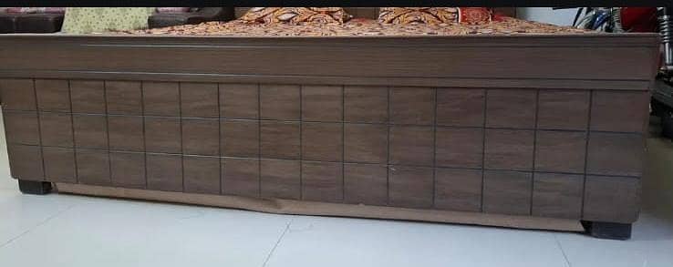 king size wooden bed with mattress