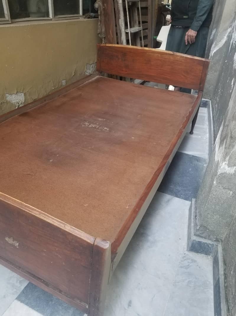 2 single bed . solid wood. 2