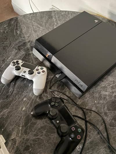 new playstation 4 with original controls only 4 month used