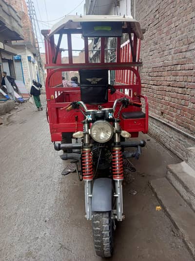 loader rickshaw Siwa all okay one hand use