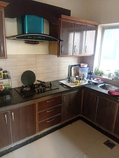 10 marla tile floor upper portion is available for rent in wapda town