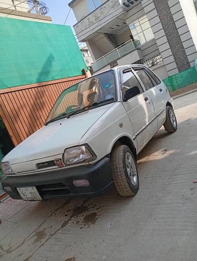 Mehran VX 2013 white colour , Islamabad number  t