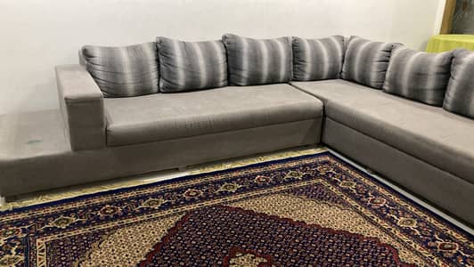 L shaped sofa with tow puffies and Dewan for sale