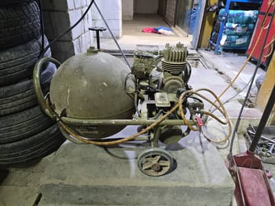 AIR COMPRESSOR