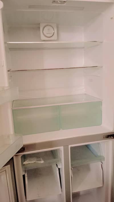 4 doors refrigerator black shine color new condition price 220,000