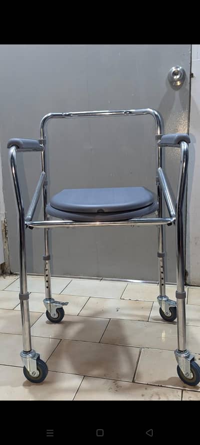 Imported moving commode chair