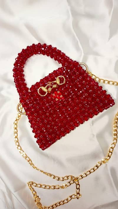 Mini red pearl bag