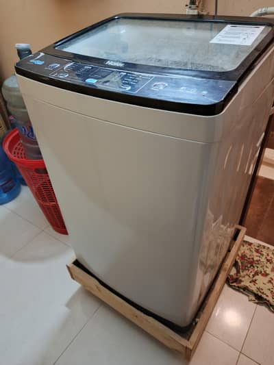 automatic very gd condition washing machine 7year in warranty .