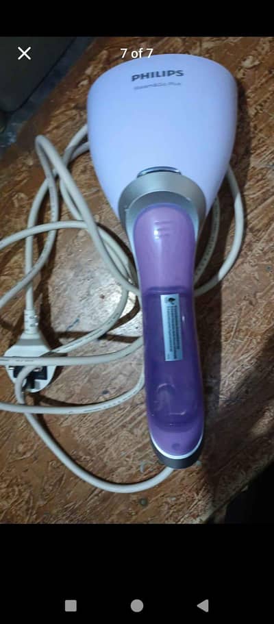 Philips original garments steamer  came from uk neat and clean