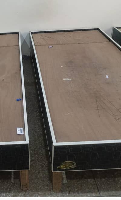 wooden drawer bed n cupboard