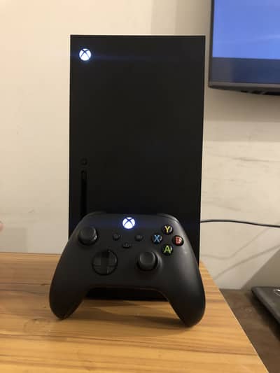 Xbox Seriex X, 1tb black, with one original controller and wire set.