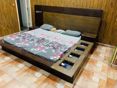 Wooden bed with lights