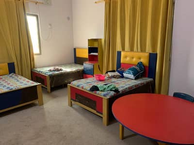 2 beds,hanging shelfs and study table for kids