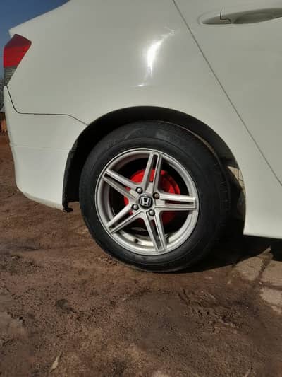 Honda city Allows rims good condition Exchange with geniun rims