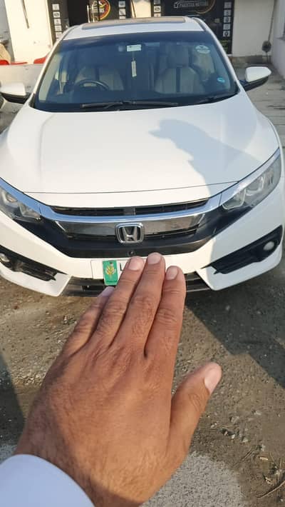 Honda civic white colour beautiful new for sale in bahria town lahore