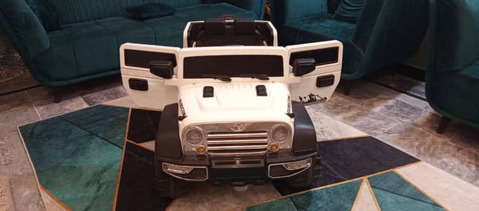 KIDS BATTERY AND REMOTE CAR