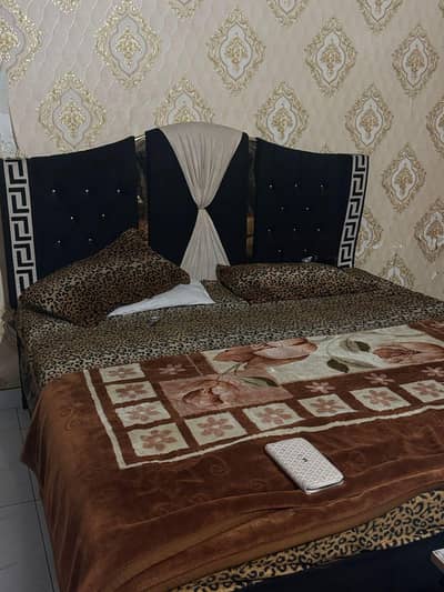 Black cushion double bed