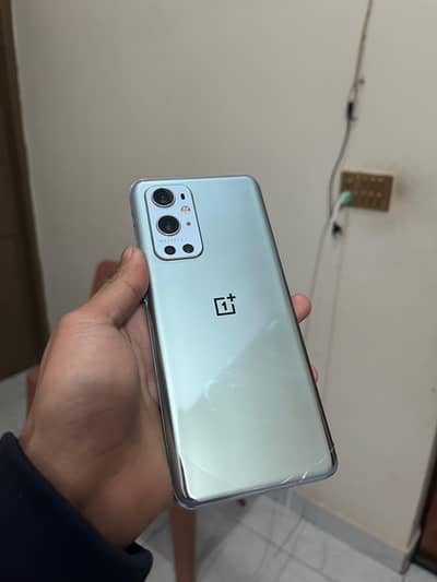 One plus 9 pro . , dual sim ,, minor broken back