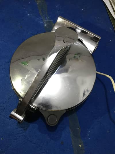 Electric roti maker 0.3. 0.3. 0.0.0.0. 1.2. 8.