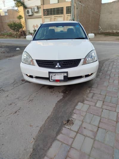 mitsubishi lancer 1.5 automatic just like brand new car.