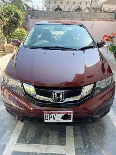 Honda City i-vtec 1300 CC Red color DHA Lady driven 1st owner