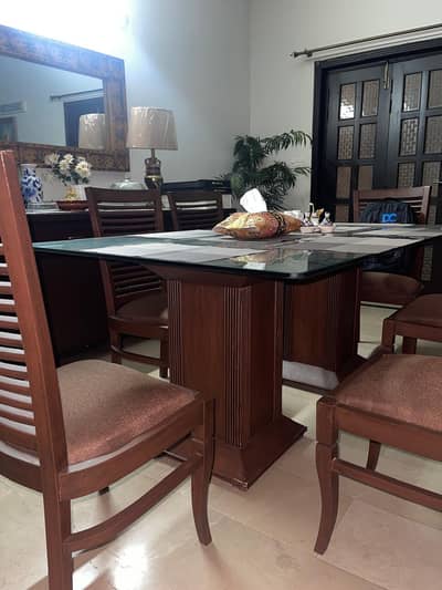 Designer's wooden Dining set, Glass top with 6 chairs for sale