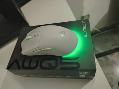 like brand new AOQELO Awq 5 gaming mouse with box and cable