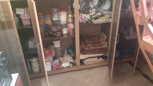 cupboard with 4 doors and inside partition. used but best for storage