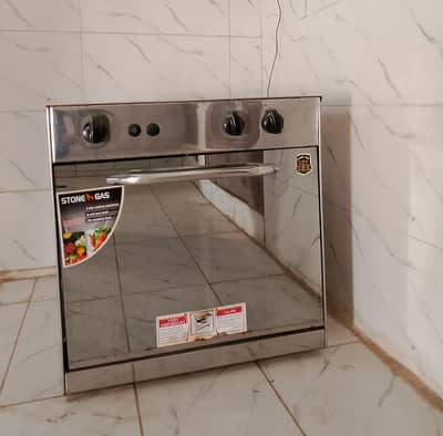 Gas oven for sale - slightly used,like new condition