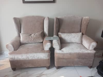 2 single seater sofas