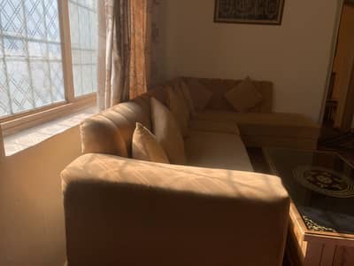7seater Lshape sofa with table is up for sale