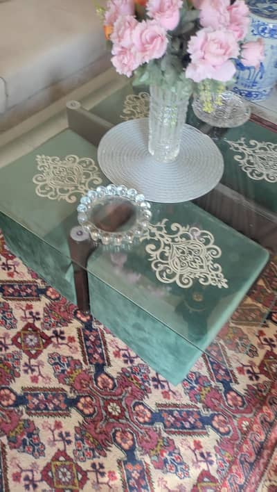 Centre table with 4 stools looking to sell