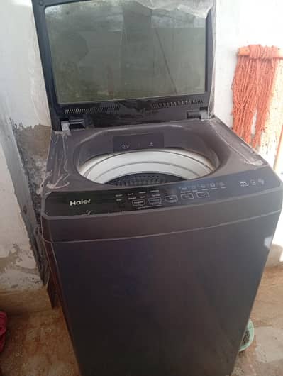 fully  Haier automatic washing machine with 12 kg capacity pillow drum