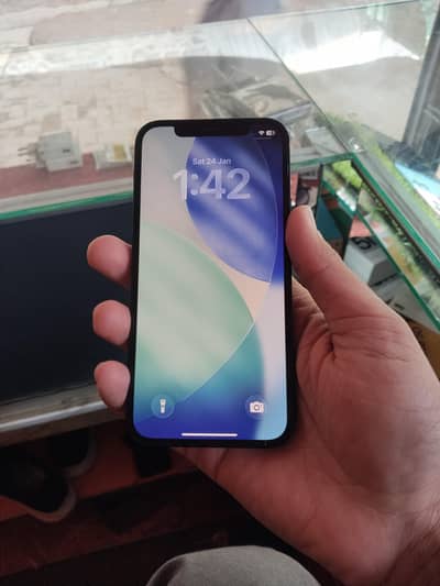 i phone 12 64 Gb water pack factory unlocked 87 battery  health n