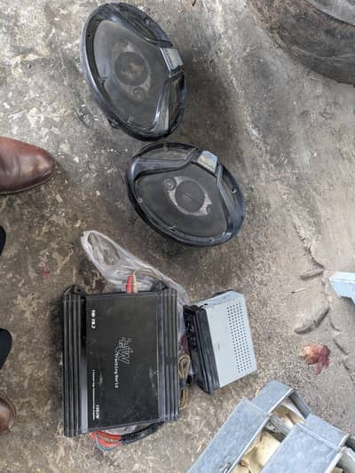 car sound system in working . . 2 channel amplifier 2 speaker and a tap