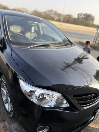 Corola 2013 XLi convert GLi