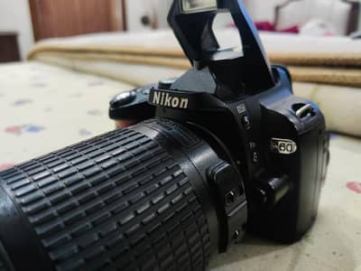 Nikon d60 dslr camera with 55-200/canon dslr/sony/dslr