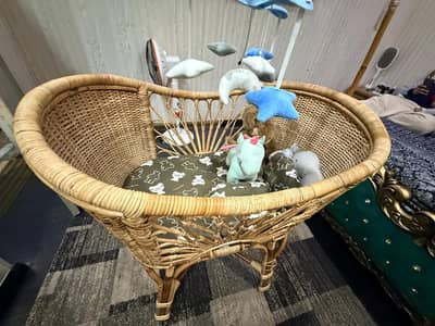 Beautiful wooden baby bassinet for sale . . .