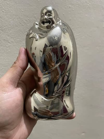 Copper laughing Buddha