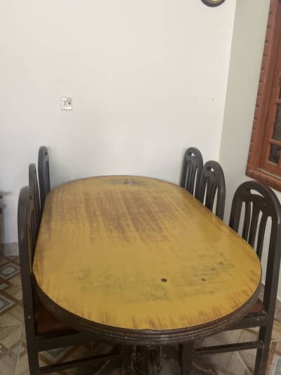 Dining table with 6 chairs available with rocking chair