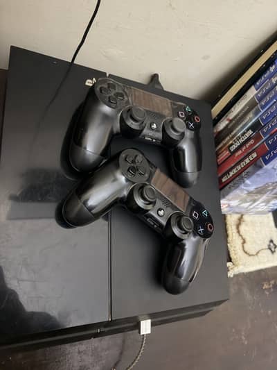 PlayStation 4 - Ps4 plus with 2 controllers and 7+ New Games