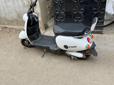 E tarbo electric scooter