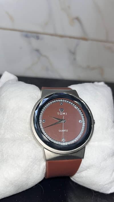 TOMI QUARTZ