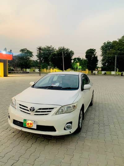 Toyota Corolla XLI 2012 model & registered in 2013. Lahore registered