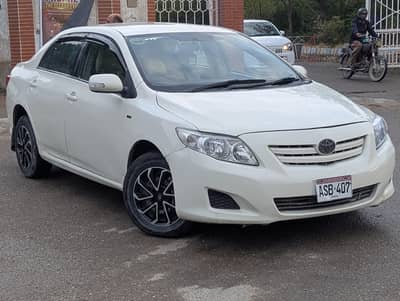 Toyota Corolla 2009 xli to GLI urgent sale btr then civic city alto