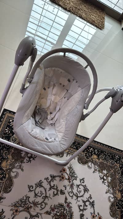 Baby automatic swing . .