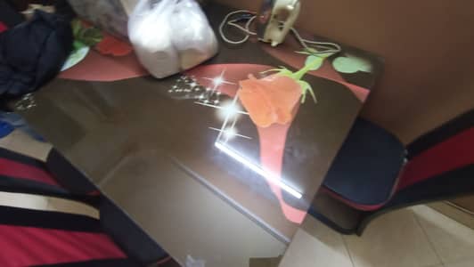 *Glass table with 6 chairs is available for sale. .