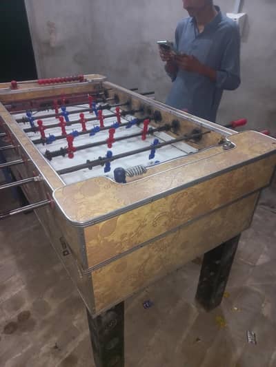 hand wood football pati