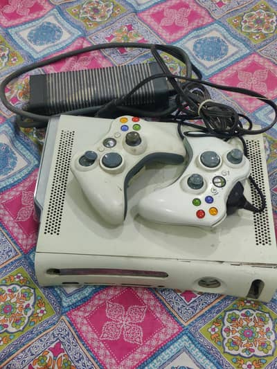 XBOX 360 with power supply and 2 controllers